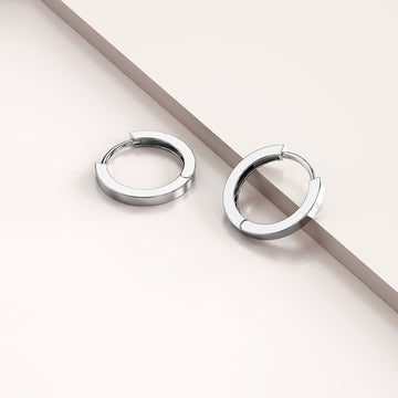 Solid 925 Sterling Silver Jerald Huggie Earrings in Silver