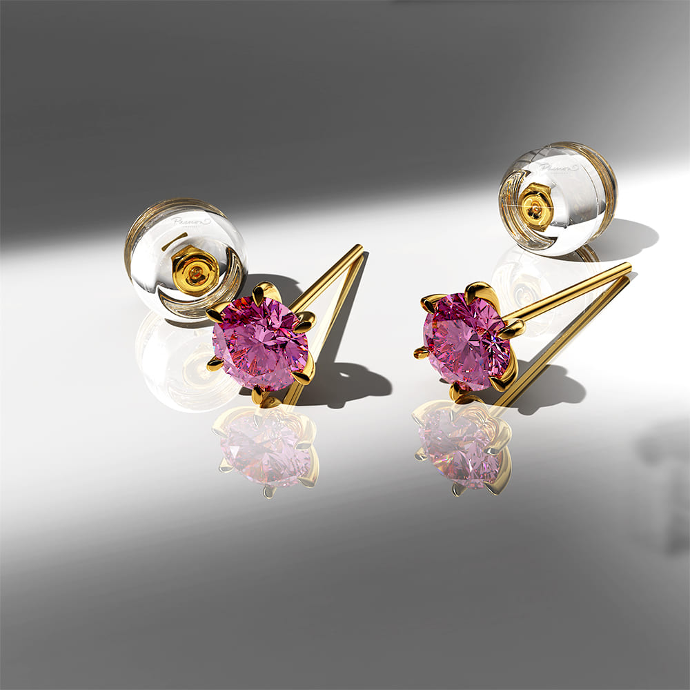 Delicate Pink Sapphire Stud Earrings Encased in 18k Gold