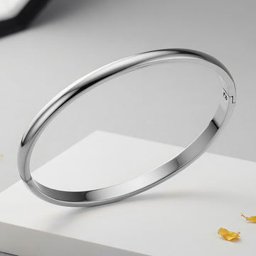 Bullion Gold Solid Stainless Steel Oval Hinged Bangle with a High Polish Finish
