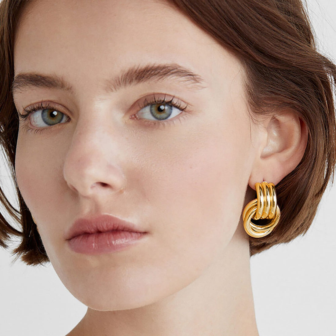 Elara Gold Layered Stud Earrings