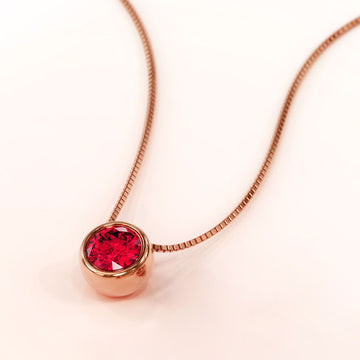 Krystal Couture Opulence Pendant Necklace Embellished with Ruby SWAROVSKI® Crystals in Rose Gold