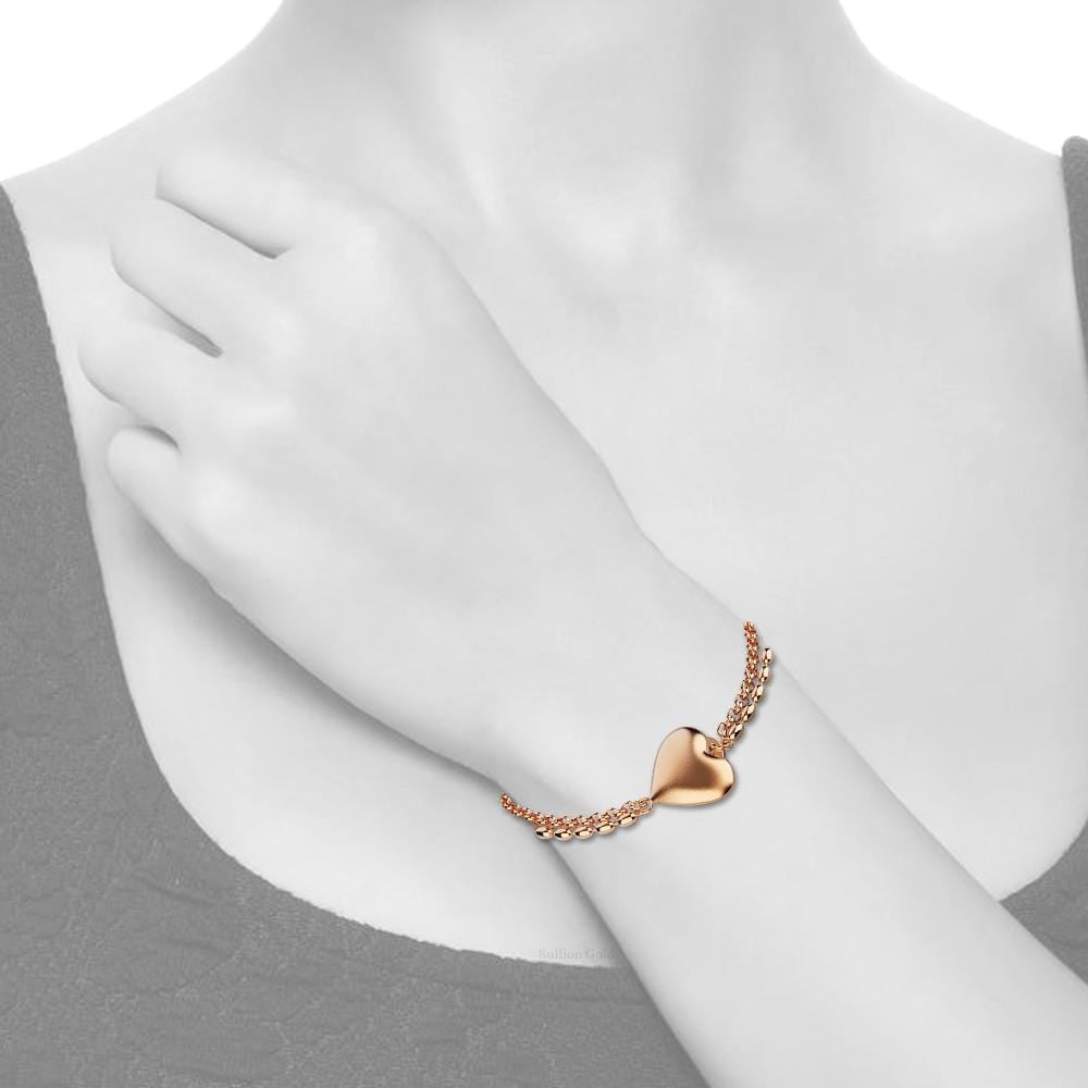 Heart-Shaped Charm Bracelet in Rose Gold Layered Stainless Steel