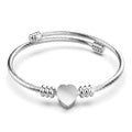 Heart Motif Charmed Stretched Spiral Coil Bangle White Gold Layered