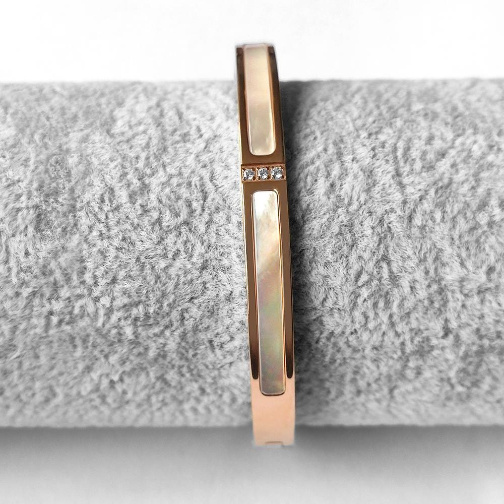 Modest Hinged Bangle in Rose Gold Layered Stainless Steel