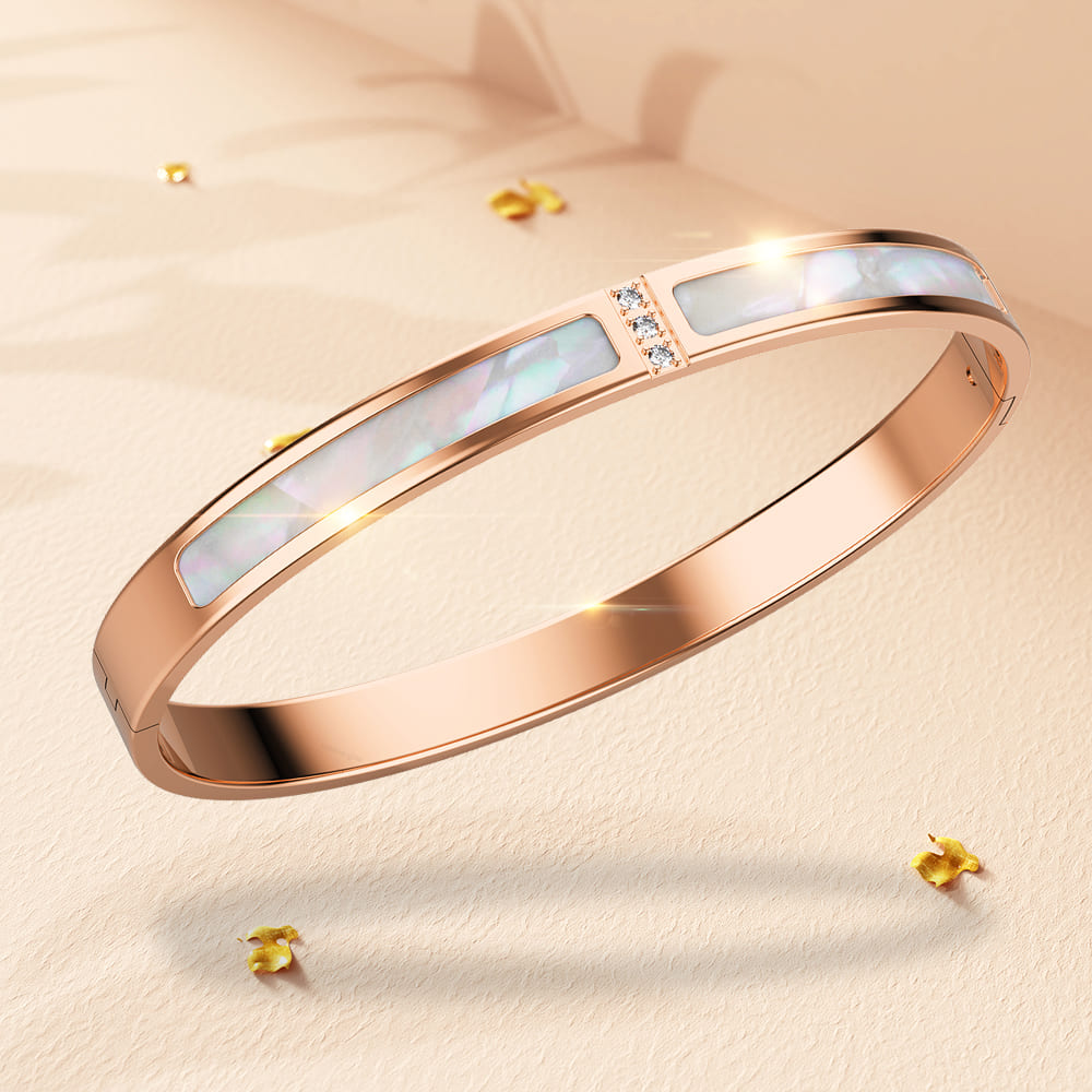 Modest Hinged Bangle in Rose Gold Layered Stainless Steel