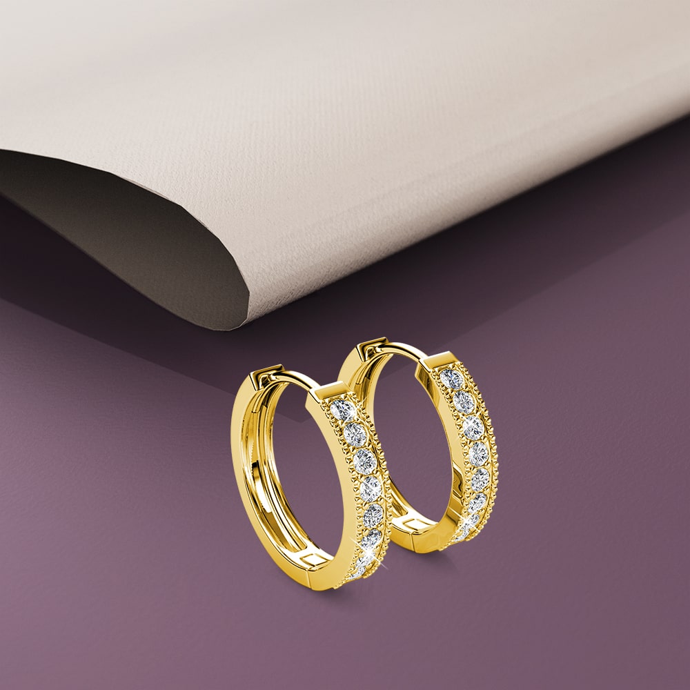 Clique Huggie Earrings Embellished with Crystals from Swarovski¬Æ in Gold