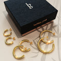 Boxed 3 Pairs of Erica Titanium Earrings Set in Gold