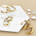 Boxed 3 Pairs of Erica Titanium Earrings Set in Gold