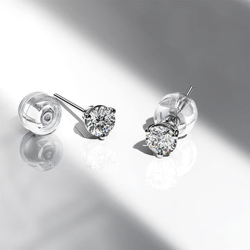 Timeless Solitaire Stud Diamond Earrings Encased in 18k White Gold